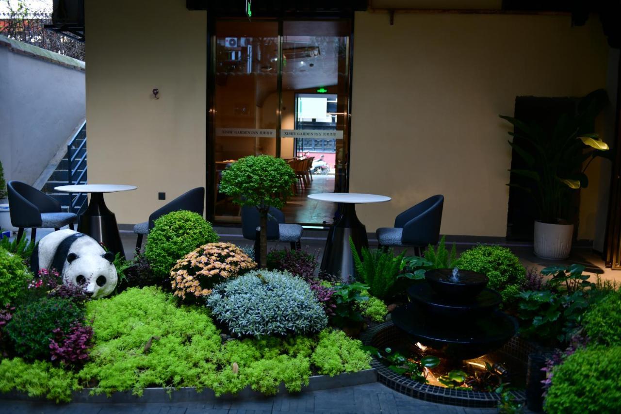 Xishu Garden Inn - Travel Agency Service - Car Rent Service - English Speaking تشنجدو المظهر الخارجي الصورة