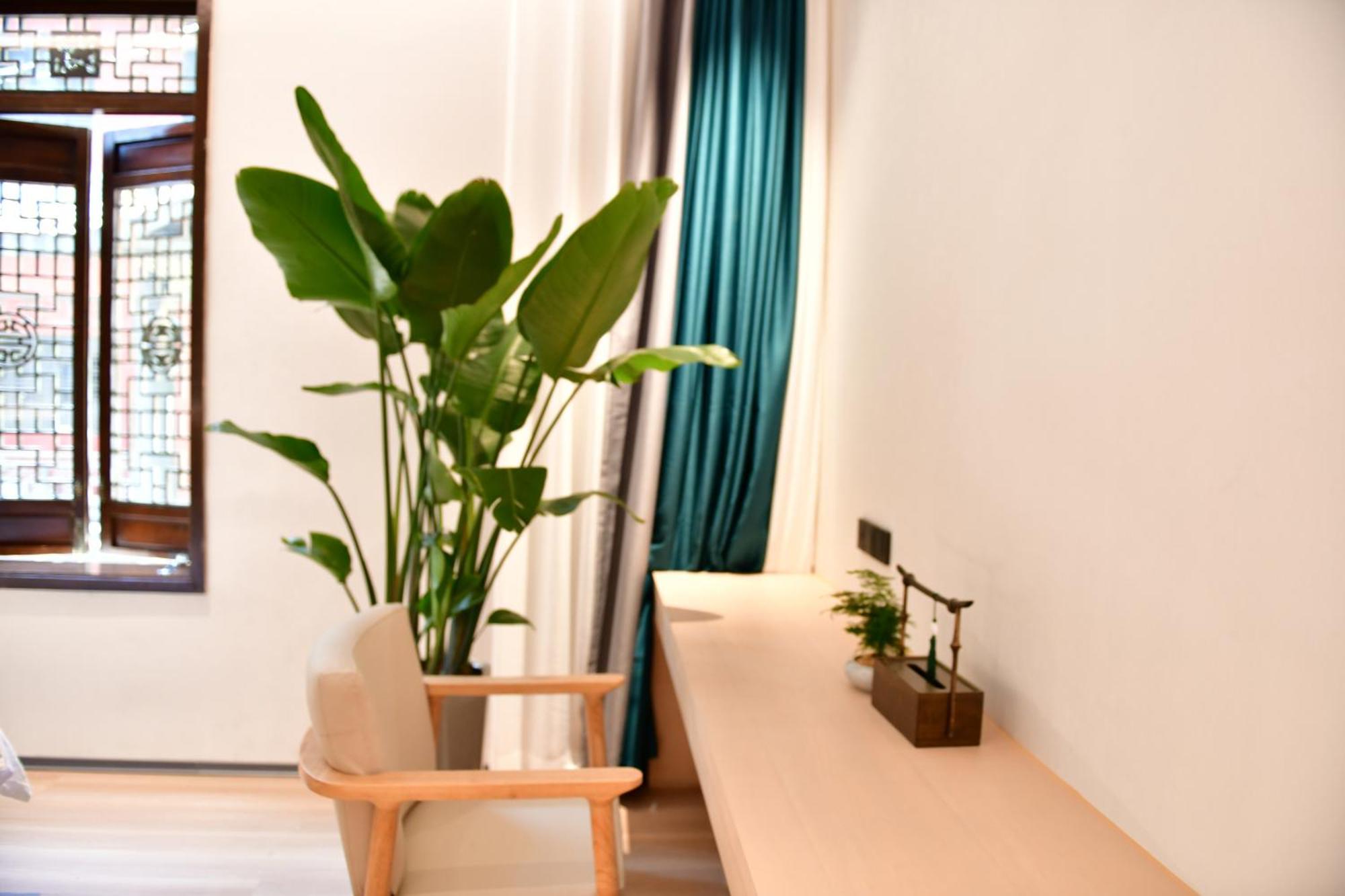 Xishu Garden Inn - Travel Agency Service - Car Rent Service - English Speaking تشنجدو المظهر الخارجي الصورة